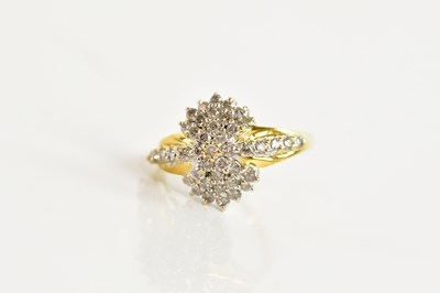 Lot 92 - An 18ct yellow gold diamond set cocktail style...