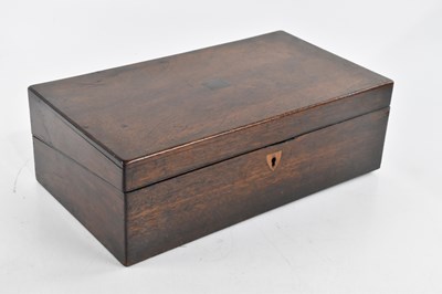 Lot 2558 - An early 20th century oak writing slope, with...