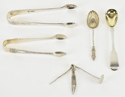 Lot 1337 - Two pairs of hallmarked silver sugar tongs,...