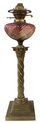 Lot 132 - A 19th century brass paraffin lamp with...