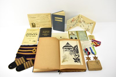 Lot 423 - A WWII prisoner of war album belonging to...