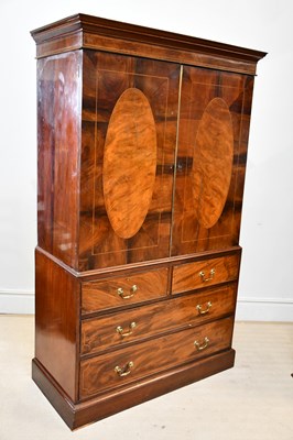 Lot 2317 - A Georgian inlaid mahogany press cupboard,...