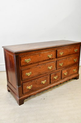 Lot 2235 - An 18th century oak crossbanded dresser base,...