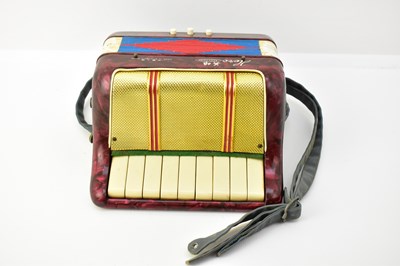 Lot 460 - A Chinese Hero children's accordion in marbled...
