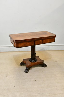 Lot 2353 - A Regency rosewood fold-over games table, on...