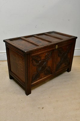 Lot 2256 - An 18th century carved oak coffer of small...