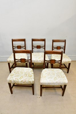 Lot 2374 - Five Georgian mahogany dining chairs, on...