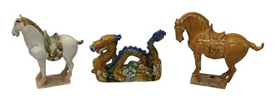 Lot 1183 - A Chinese treacle glazed Tang Dynasty style...