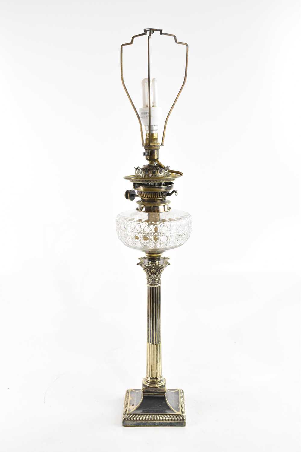 Lot 4 - A Victorian silver plated oil lamp, with cut...