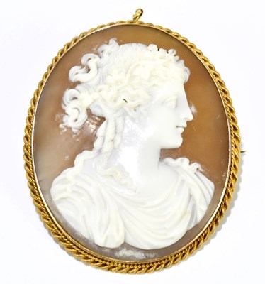 Lot 1452 - A Victorian 15ct yellow gold framed oval cameo...