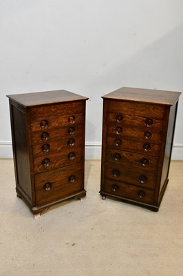 Lot 2455 - A pair of narrow oak pillar type chests of six...