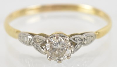 Lot 1458 - A yellow metal diamond set solitaire ring, the...