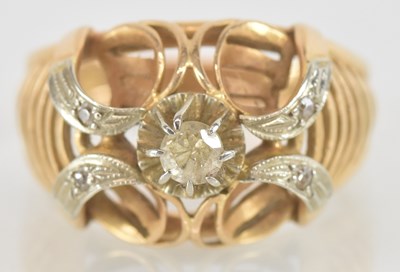 Lot 1459 - A yellow metal diamond set ring, the central...