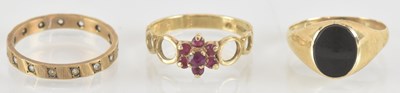 Lot 1444 - A 9ct yellow gold onyx set signet ring, size N,...