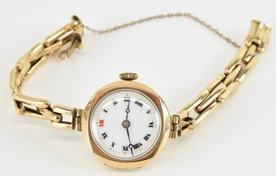 Lot 1658 - A 9ct yellow gold lady's wristwatch on 9ct...