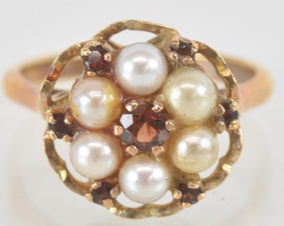 Lot 1480 - A 9ct yellow gold seed pearl and garnet set...