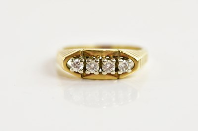 Lot 1334 - A 14ct yellow gold four stone diamond ring,...
