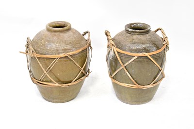Lot 219 - A near pair of c.1900 Chinese pickle jars...