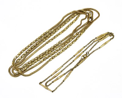 Lot 1375 - A yellow metal chain, length approx. 64cm, and...