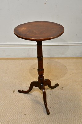 Lot 2286 - A 19th century oak tripod table, height 70cm.