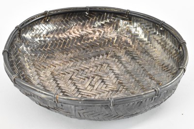 Lot 1291 - A Japanese woven white metal wirework bowl,...