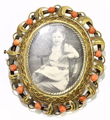Lot 1469 - A large late Victorian yellow metal coral bead...