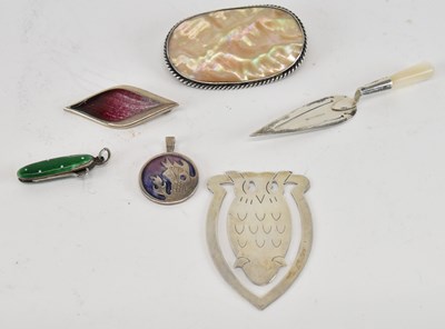 Lot 1554 - A sterling silver paperclip/bookmark modelled...