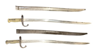 Lot 427 - Two WWI French chassepot sword bayonets with...