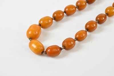 Lot 1652 - A vintage hand tied graduated egg...