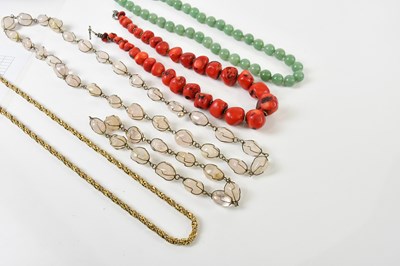 Lot 461 - A hand tied polished jade bead set necklace,...