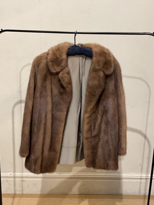 Lot 1990 - A short light brown mink fur coat, fully lined,...