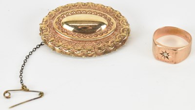 Lot 1396 - A 9ct rose gold signet ring, with star inset...
