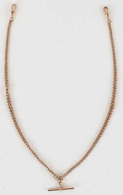 Lot 1645 - A 9ct rose gold Albert watch chain, with T-bar...