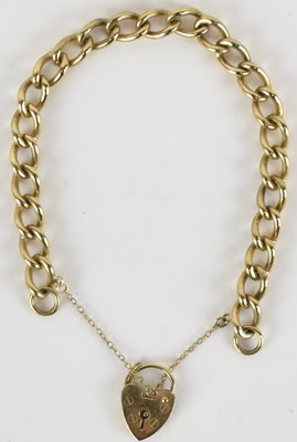 Lot 1373 - A 9ct gold bracelet with 9ct gold heart shaped...