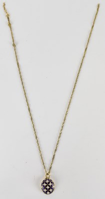 Lot 1446 - A 9ct gold flat curb necklace with ring clasp...