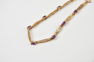 Lot 1576 - A 9ct yellow gold and amethyst set bracelet,...