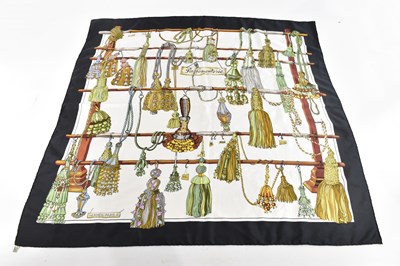Lot 1909 - HERMÈS; a 100% silk Passementerie scarf...