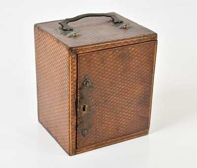 Lot 2512 - A leather cased table cabinet with three...
