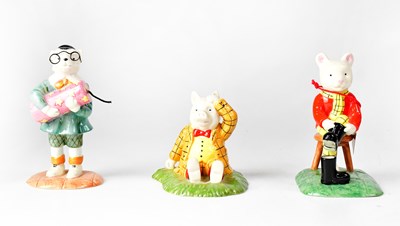 Lot 189 - ROYAL DOULTON; three Rupert the Bear figures,...