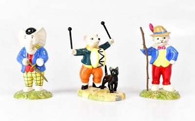 Lot 190 - ROYAL DOULTON; three Rupert the Bear figures,...