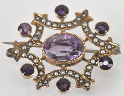 Lot 1469 - A Victorian amethyst and seed pearl set open...
