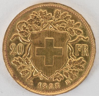 Lot 1581 - A Helvetia 1935 Swiss twenty franc coin,...