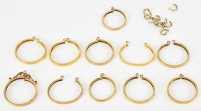 Lot 1392 - Eleven 9ct gold coin pendant mounts and eleven...