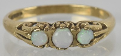 Lot 1537 - A 9ct gold ring, with three graduated small...