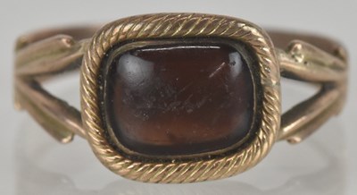 Lot 1538 - A Victorian 9ct gold mourning ring, with...