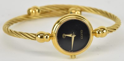 Lot 1685 - GUCCI; a model 2700L lady's quartz bracelet...