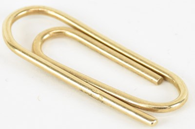 Lot 1472 - A 9ct gold money clip in the form of a...