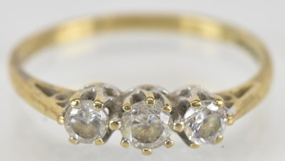 Lot 1540 - A 9ct gold ring set with three white stones,...