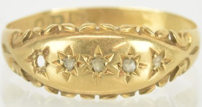 Lot 1522 - An 18ct gold Victorian style ring, with five...