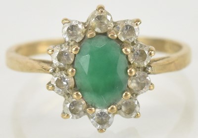 Lot 1539 - A 9ct gold dress ring, with claw set central...